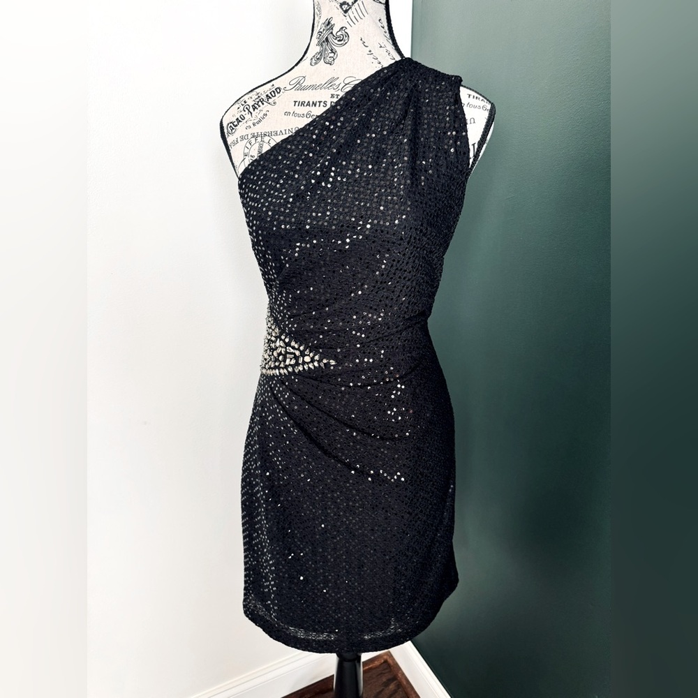 Size 8 Jackie Jon black one shoulder cocktail dress. In excellent condition.
